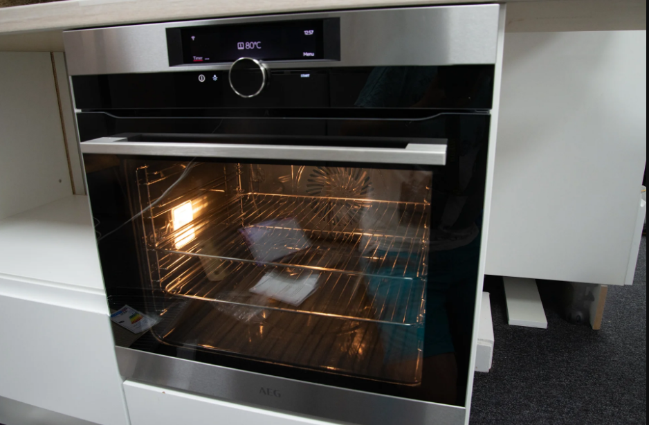 a grey pyrolytic single oven with an LED digital display